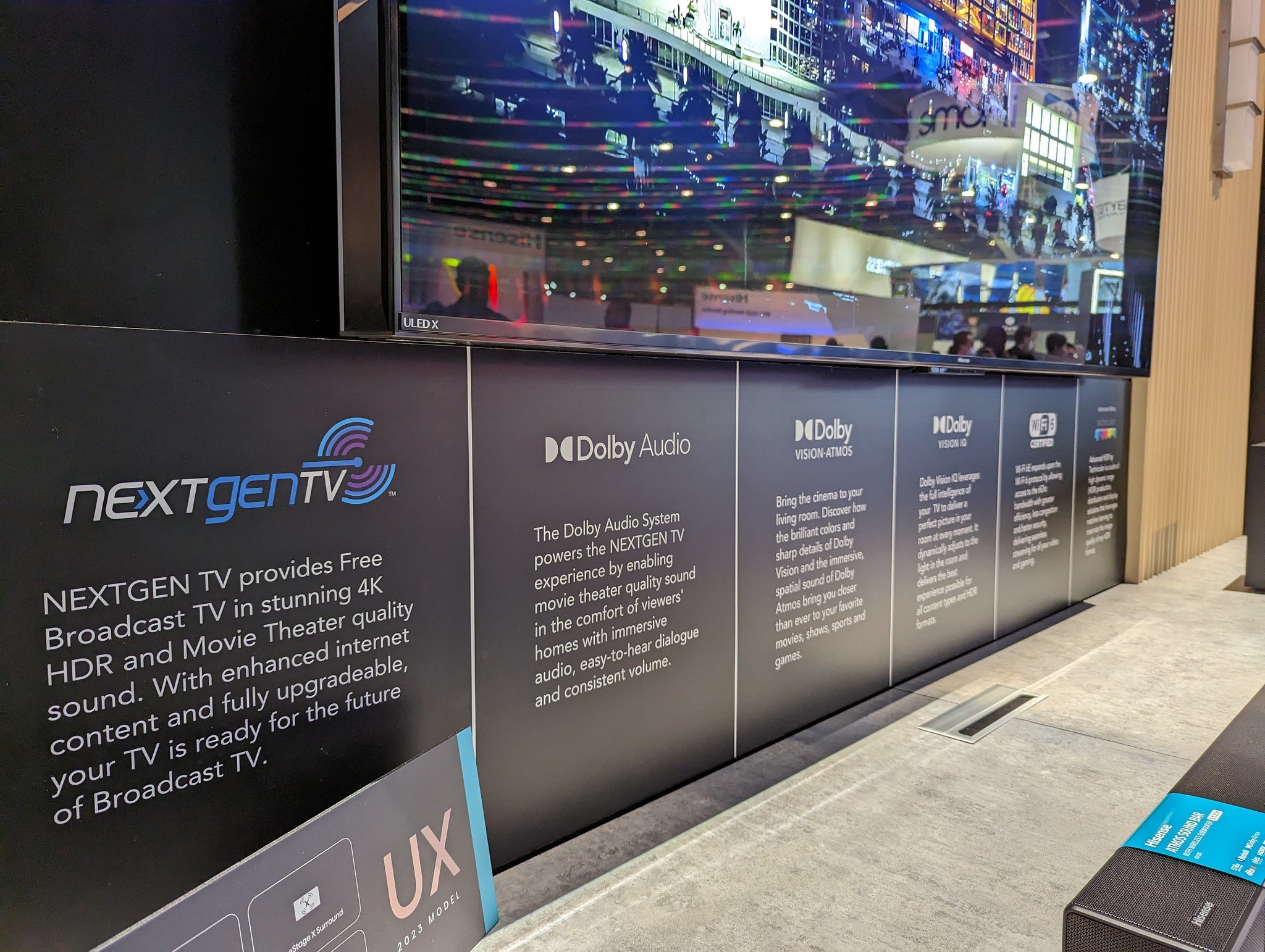A display at Hisenses CES 2023 exhibit lists NEXTGEN TV as a technology featured on its new sets