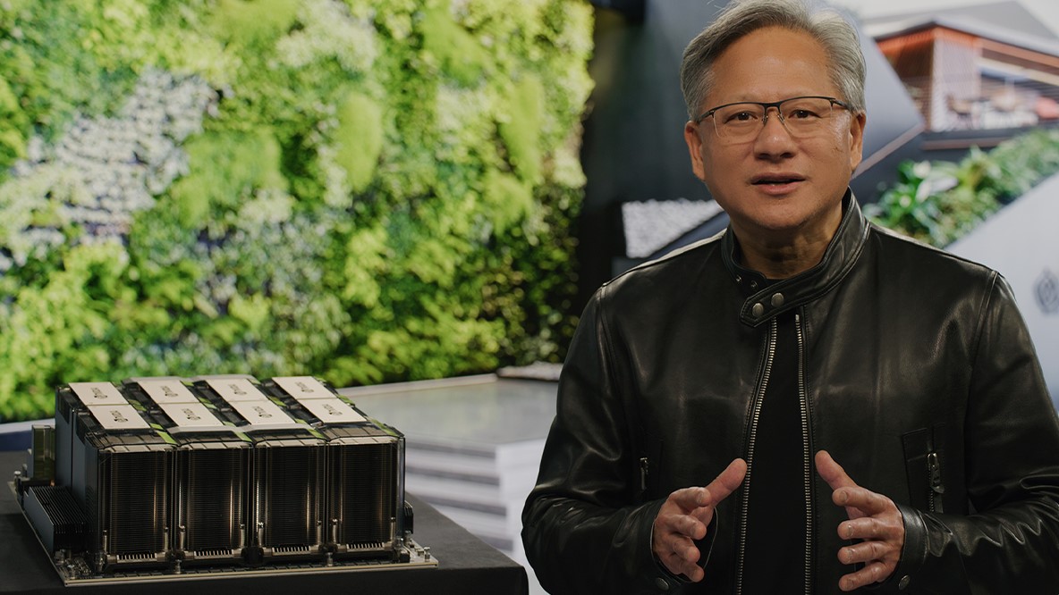Nvidia CEO next to DGX supercomputer 8 H100 GPUs
