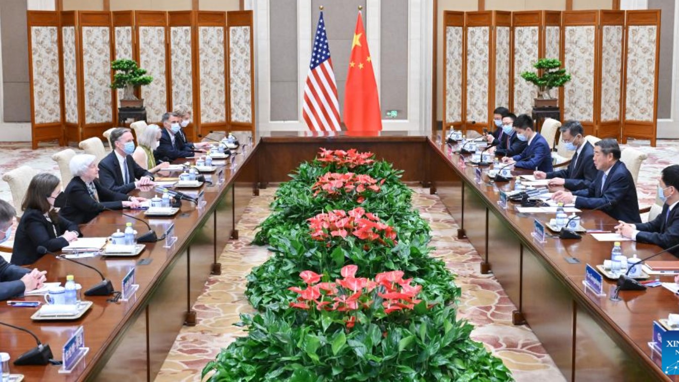 US-China leaders meeting at two tables across from each other