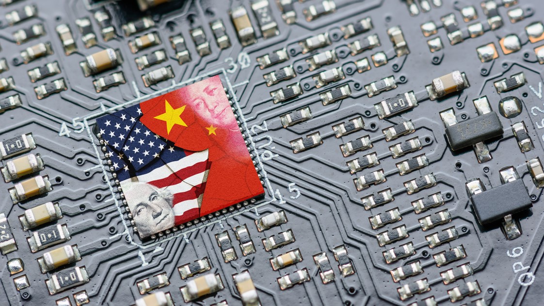 little chiplet on circuit board with images of china and us flags
