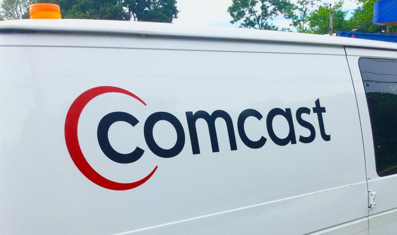Utility van with the word Comcast on the side