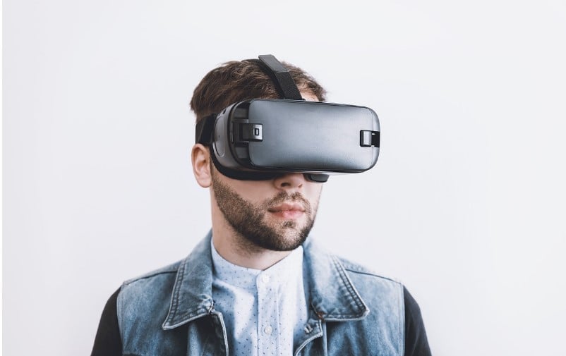model wears virtual reality headset