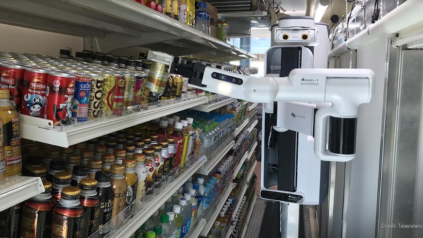 robot arm puts can on shelf