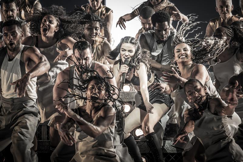 Rachel Zegler (Eva Perón) & cast of Evita. Credit - Marc Brenner