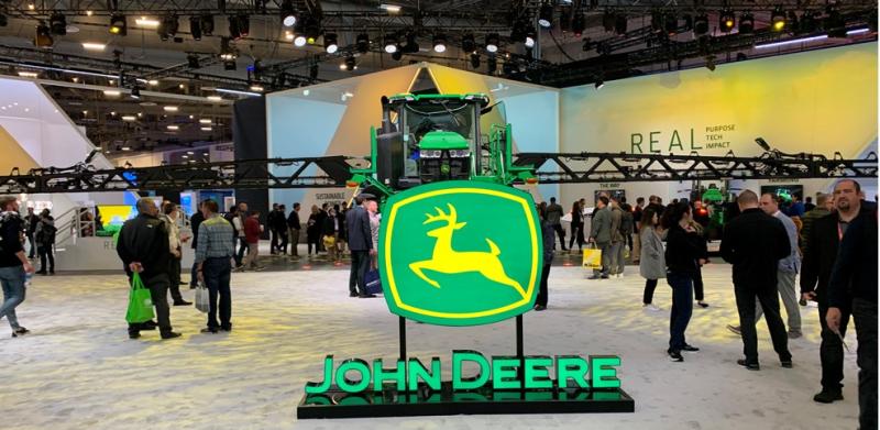 huge deere sprayer at ces 2023 booth