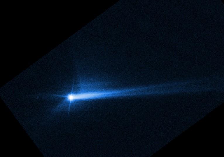 asteroid debris, blue on black image