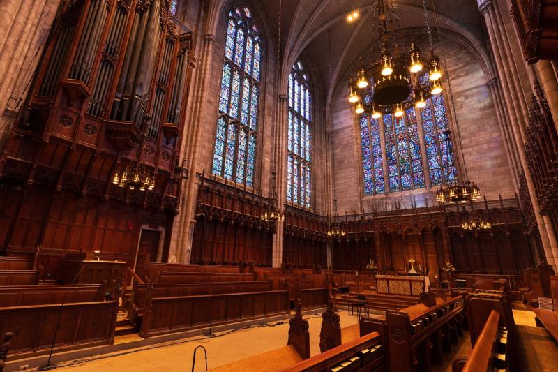 View of stained glass windows and organ from the Princeton Chapel's altar.