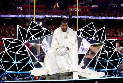 Usher on the throne cart. Kevin Mazur/Getty Images for Roc Nation