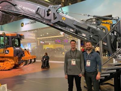 Don and John Gallagher of Gallagher Asphalt at John Deere booth, CES 2024 
