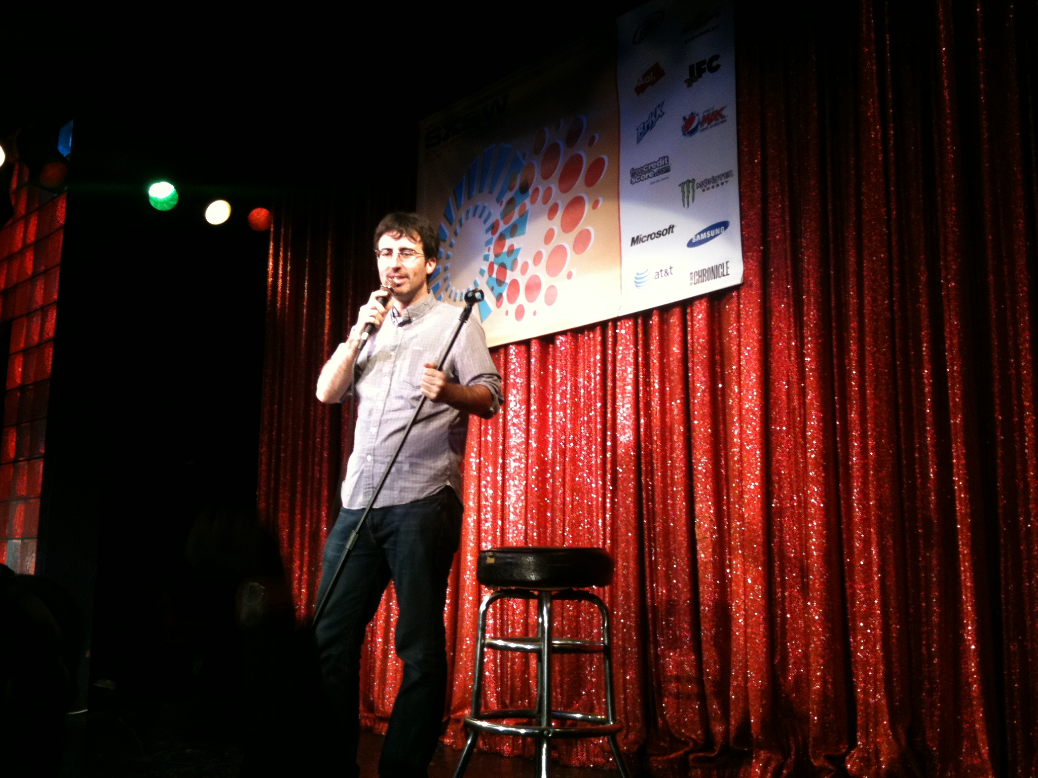 Man doing standup at comedy club