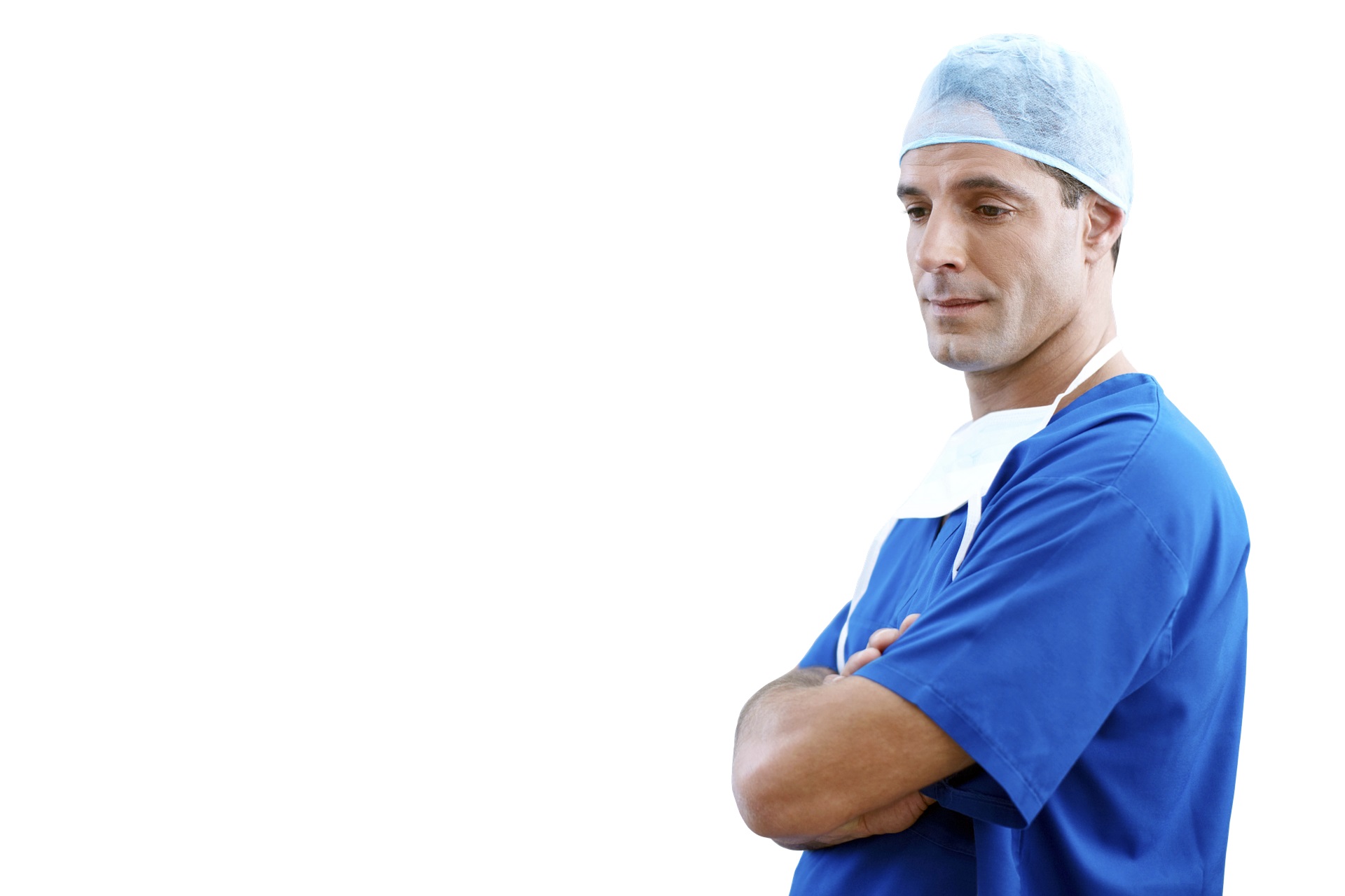A photo of a male clinician in scrubs