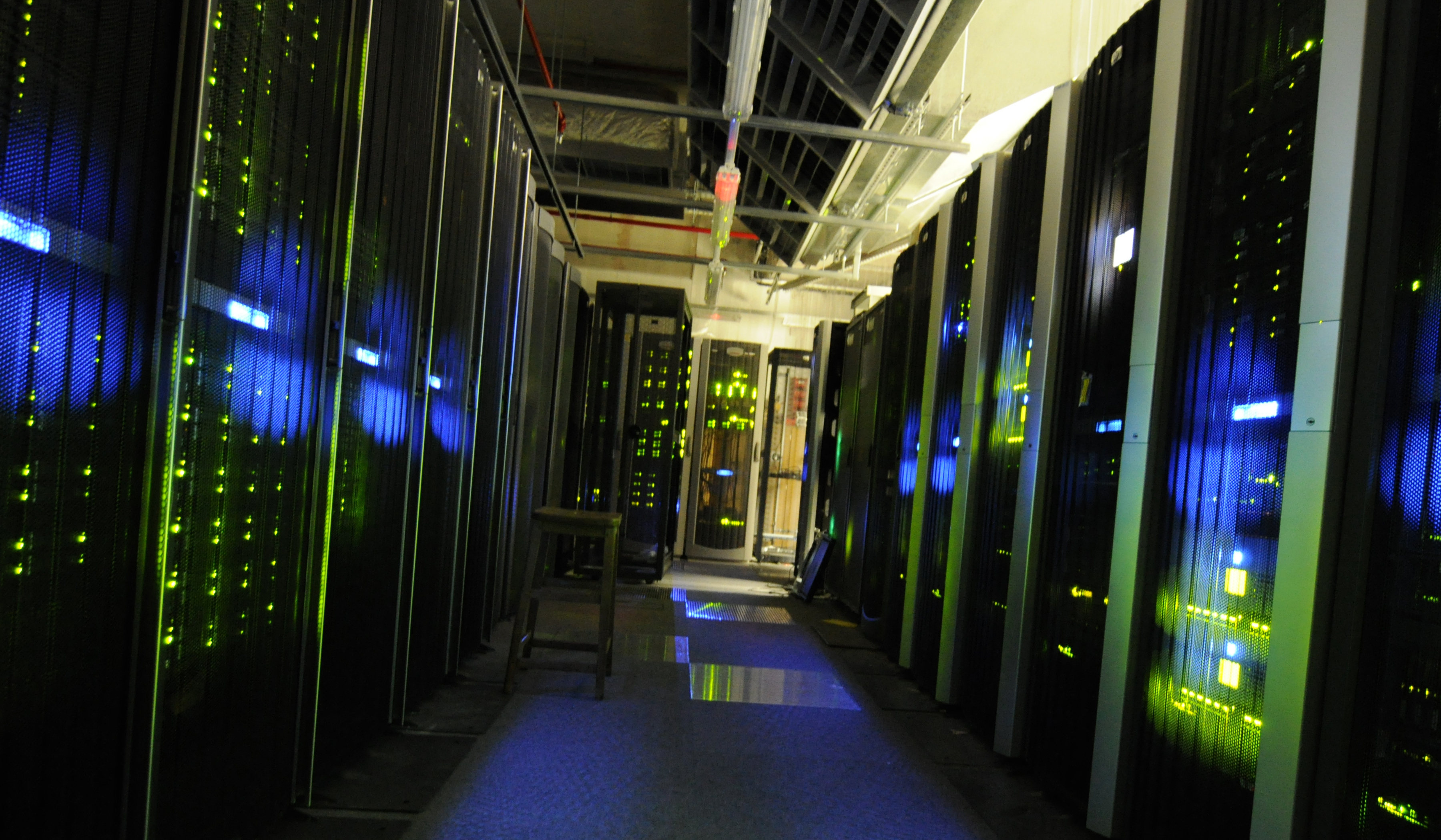 A dark room full of computer servers