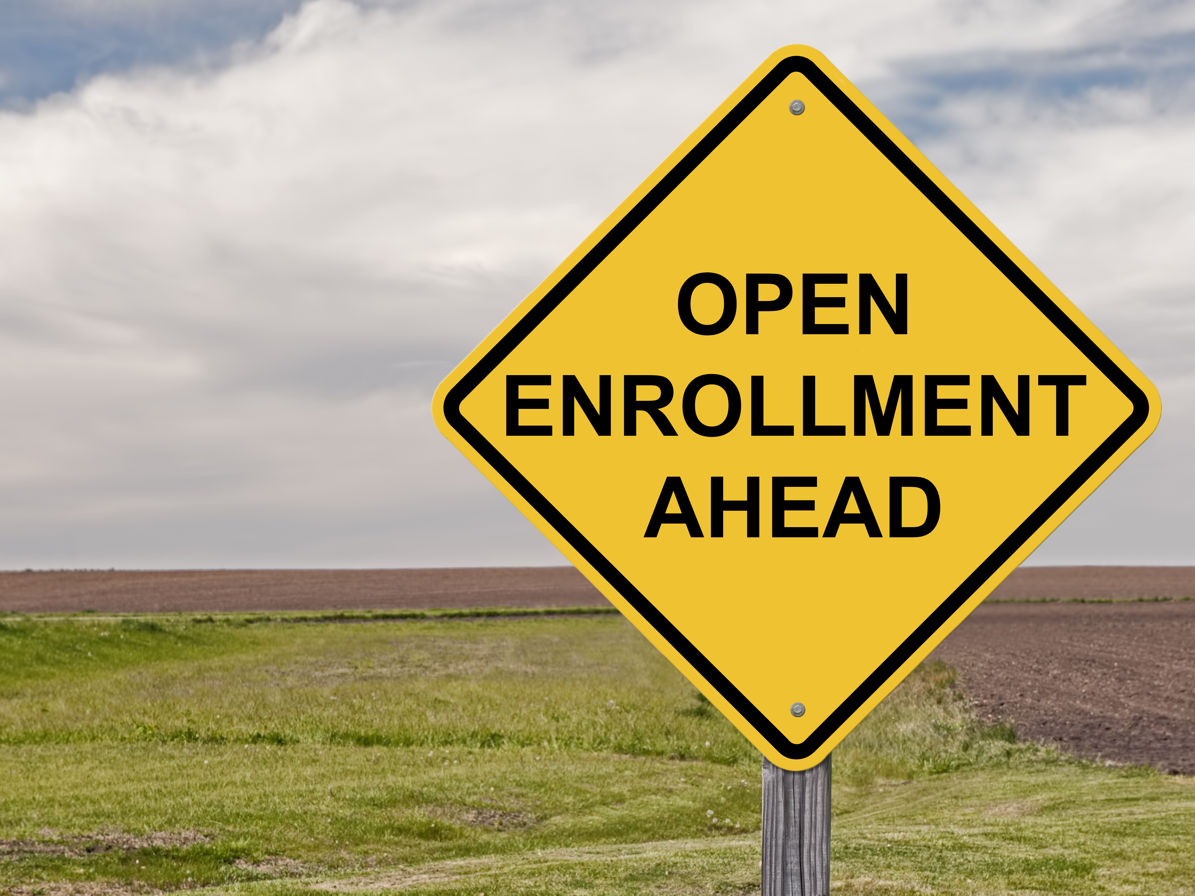 Open enrollment ahead sign 