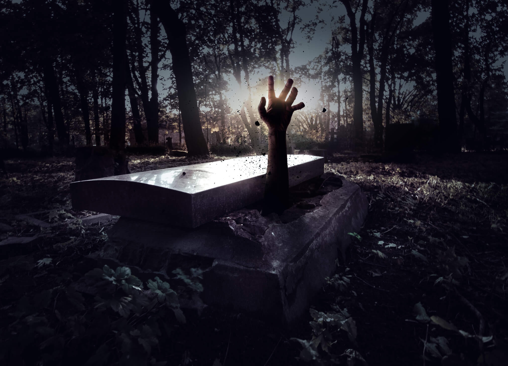Zombie sticking hand out of grave