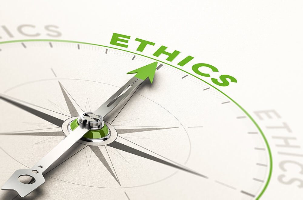 a compass pointing to ethics