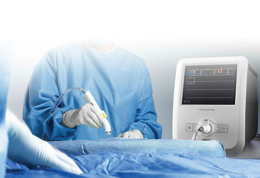 Surgeon using MarginProbe during lumpectomy