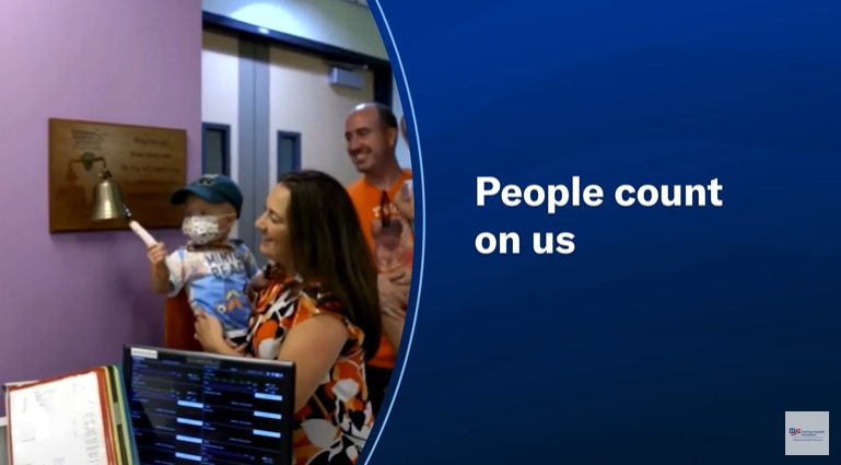 A still from the AHAs 30-second ad showing a pediatric patient ringing a bell accompanied by the text People count on us