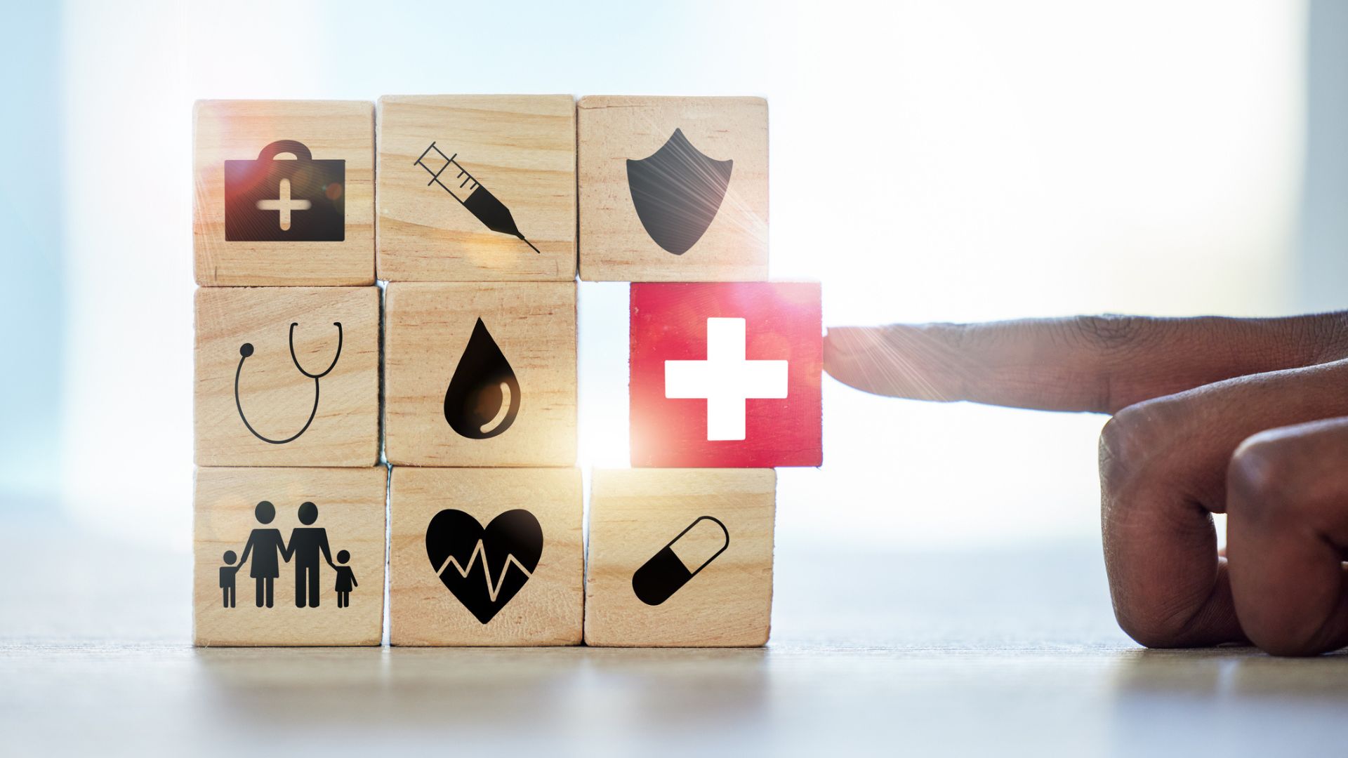 Medical symbols on wooden blocks