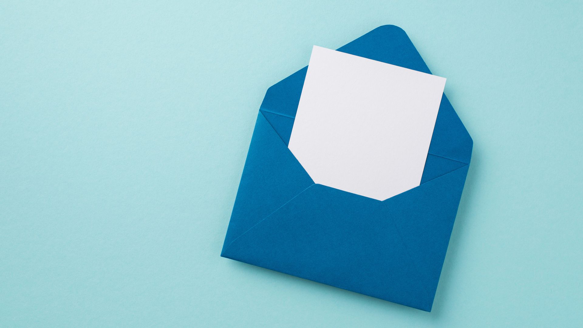 Top view of open blue envelope