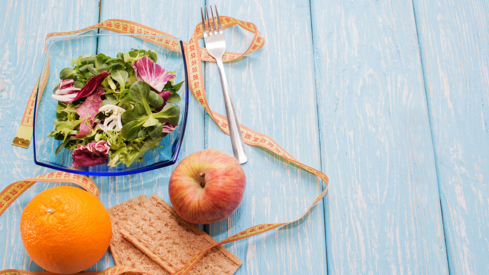 Healthy food and by tape measure