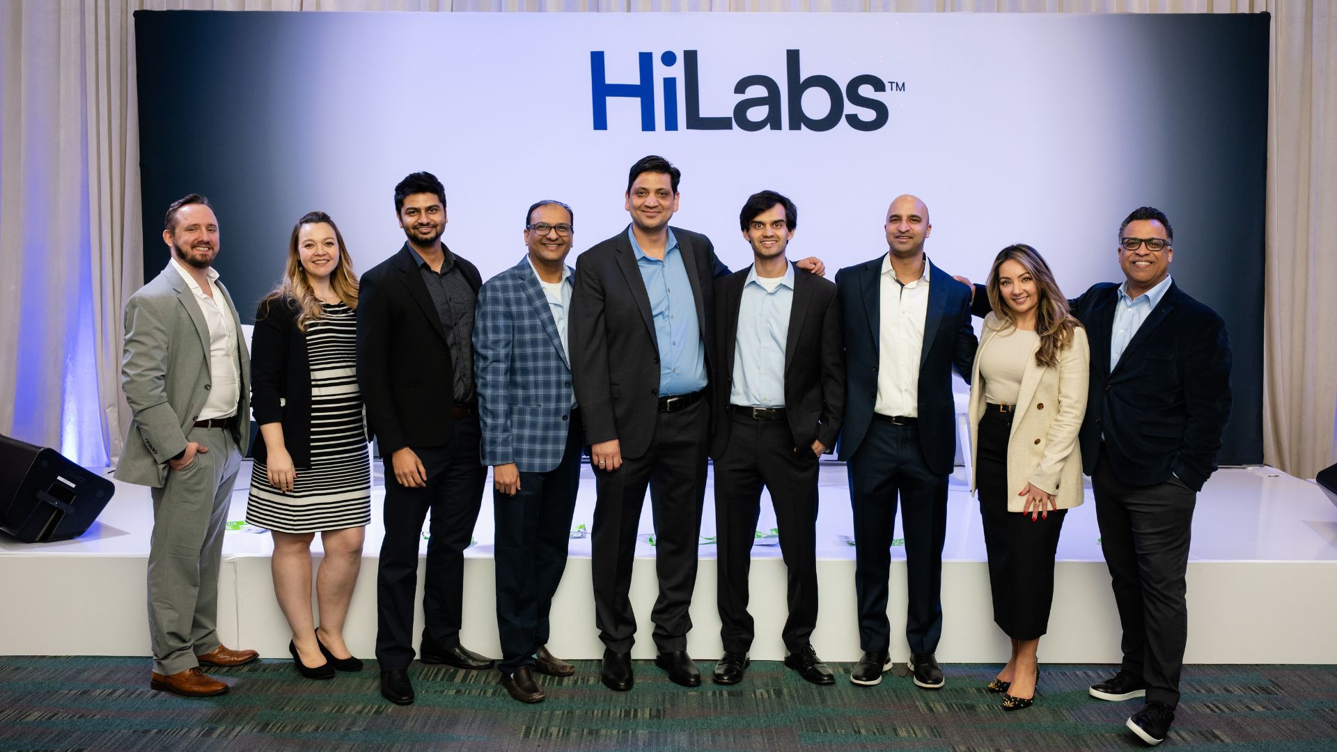HiLabs execs smile for a photo