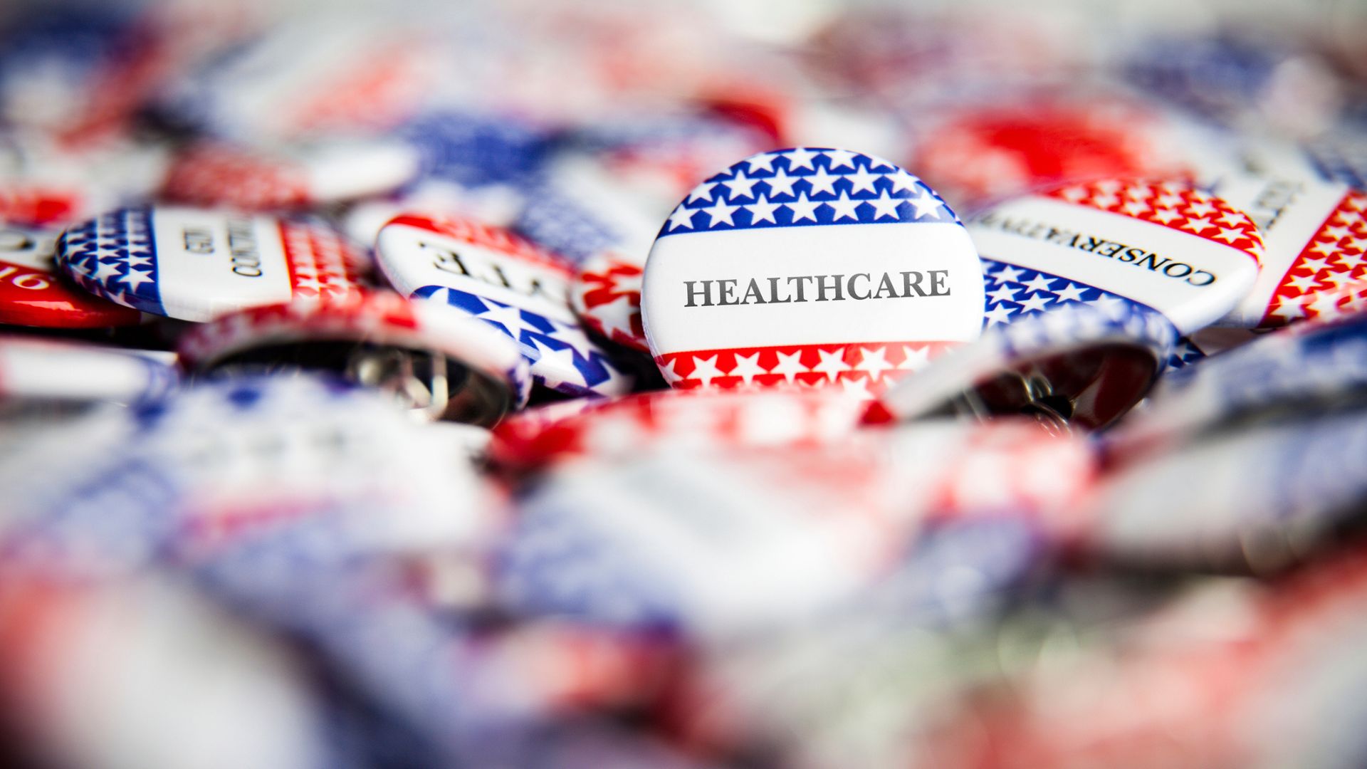 Election vote buttons that say healthcare