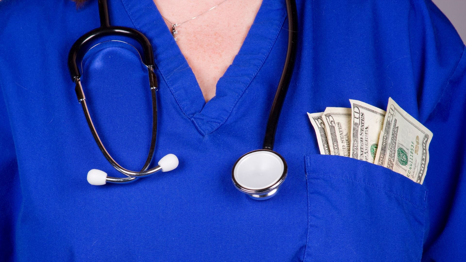 Nurse with money in front pocket
