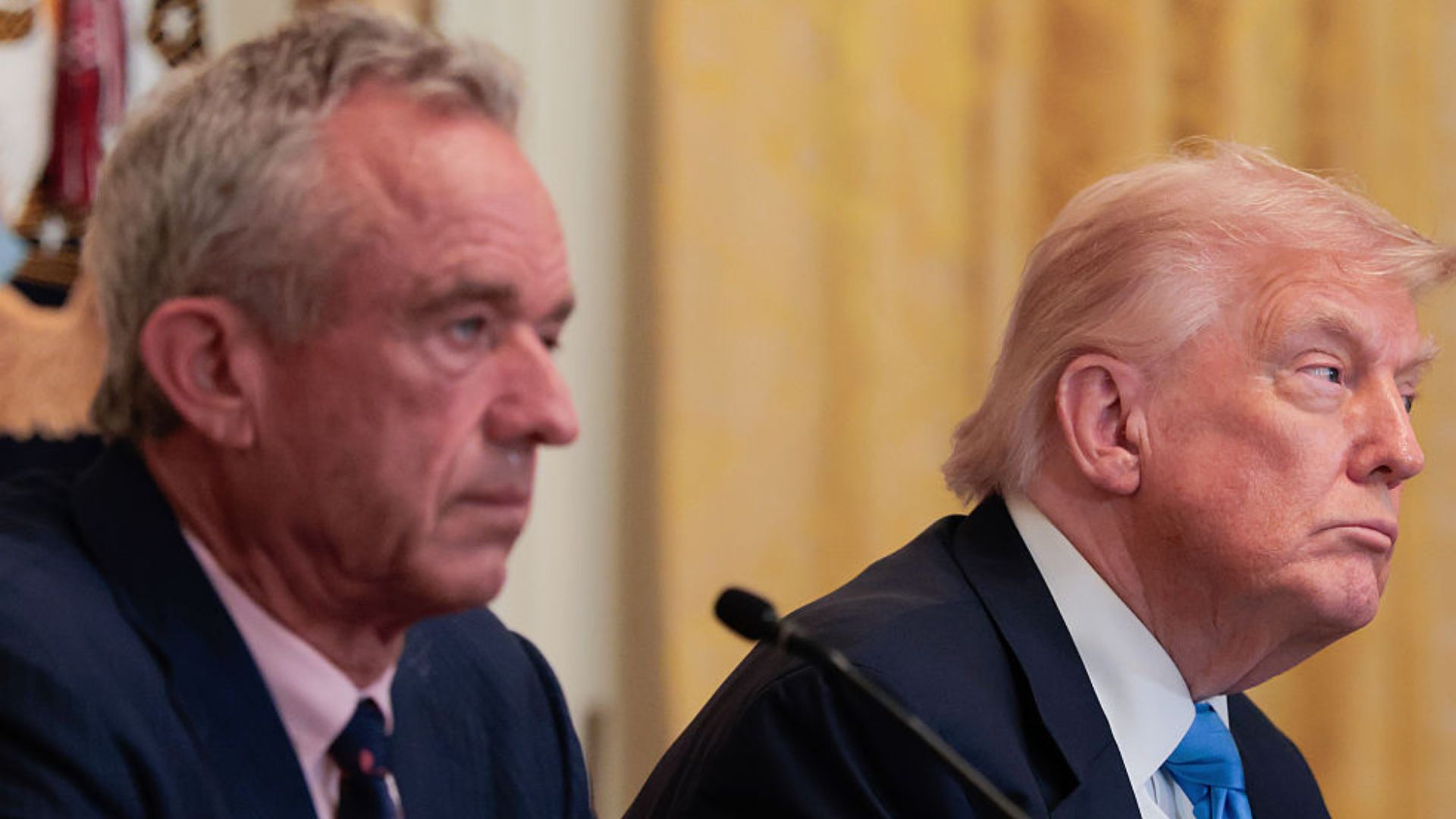 President Donald Trump and HHS Secretary Robert F Kennedy Jr listen to speakers during an event on Health Technology in the