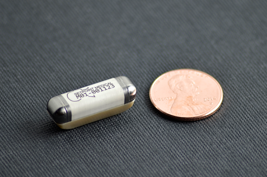Setpoint Medicals bioelectronic device beside a penny for scale