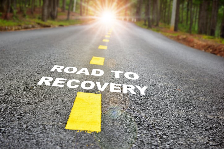 A road that reads road to recovery