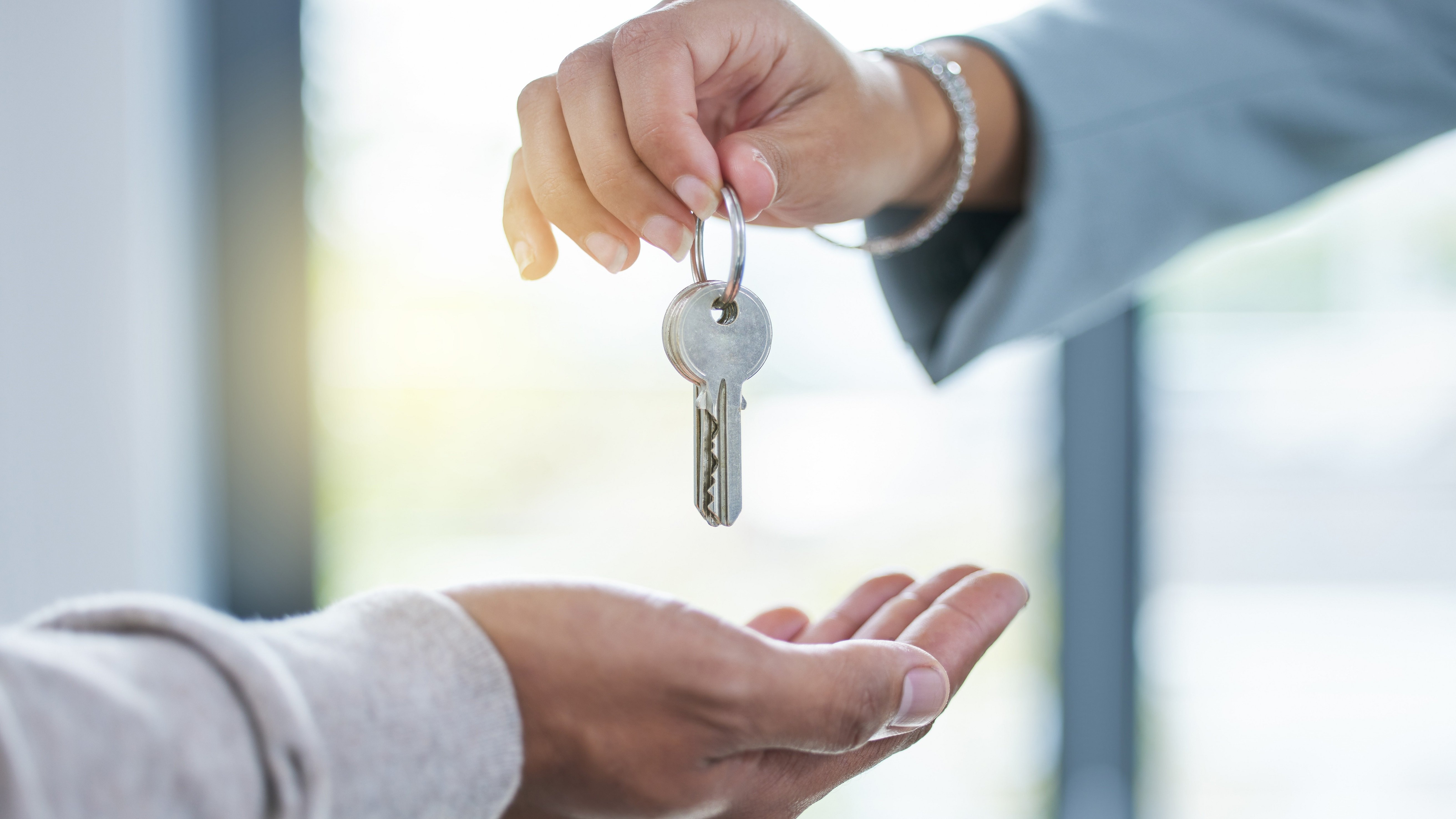 hand over keys buy house gift takeover acquisition