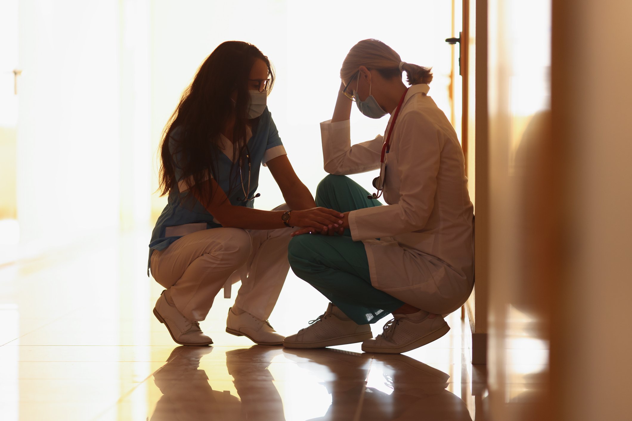 Nurse support colleague doctor
