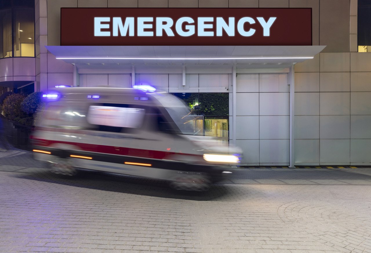 ambulance in front of hospital emergency room
