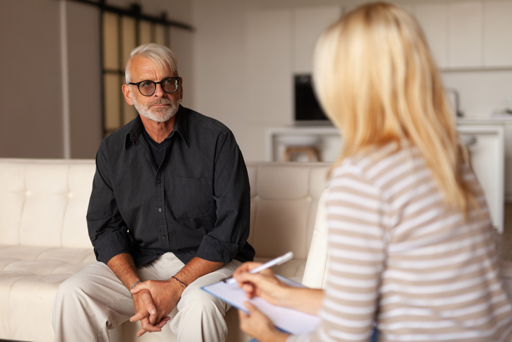 A man attends a therapy appointment
