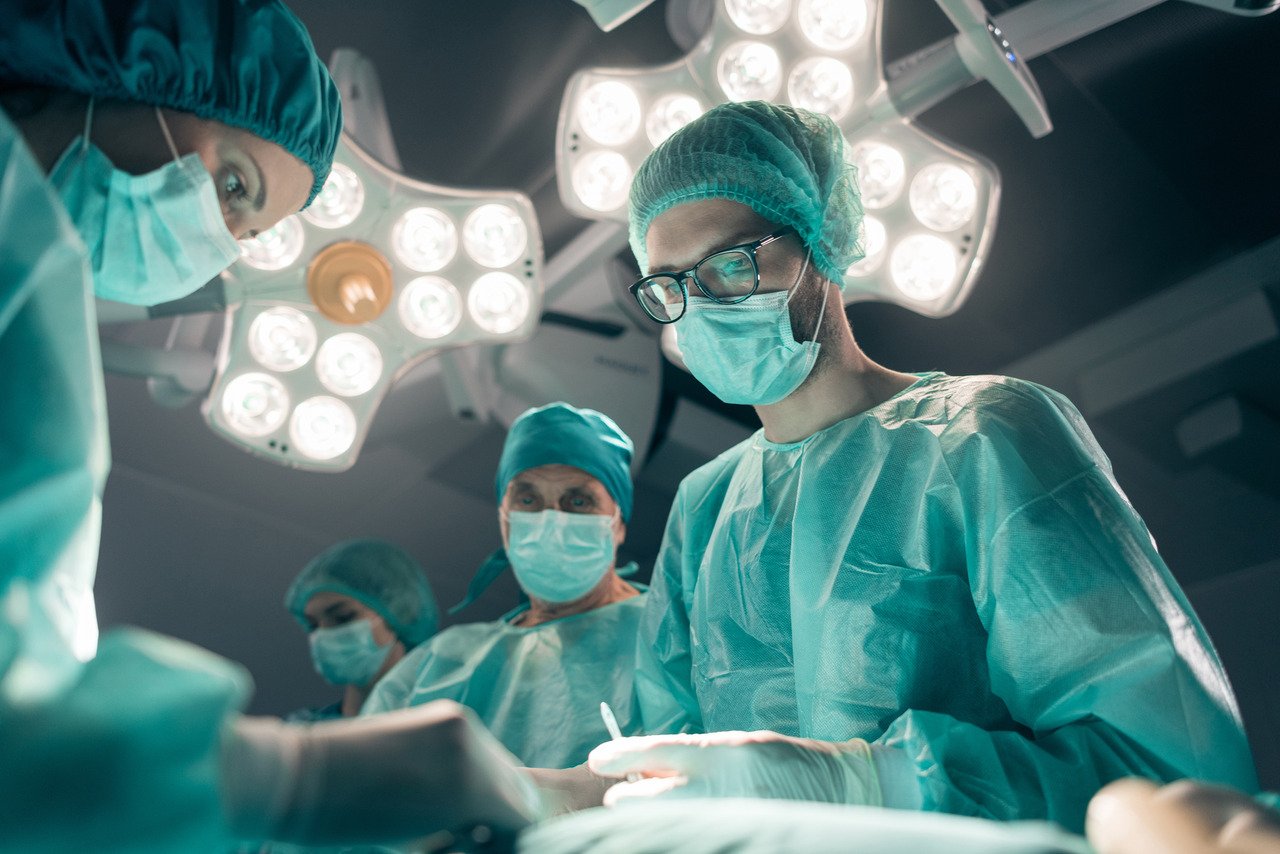 surgeon performing surgical operation in operating room