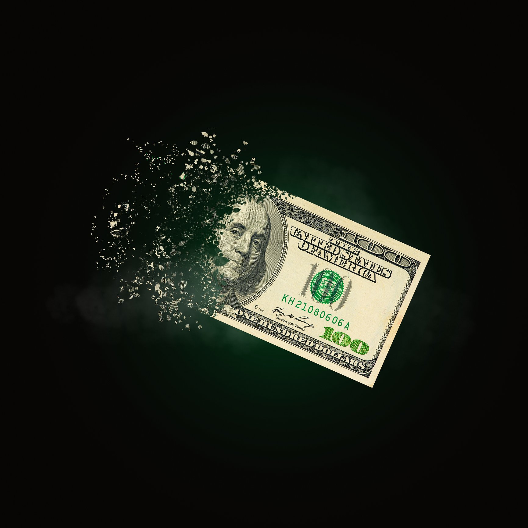 100 dollar bills scattered in the air money inflation concept