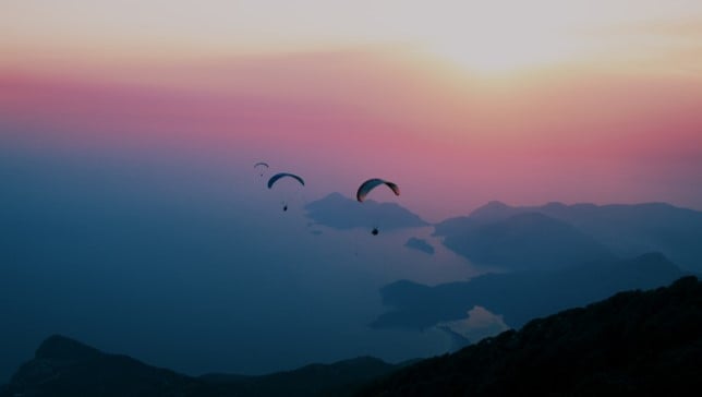 parachute sunset paragliding chutes