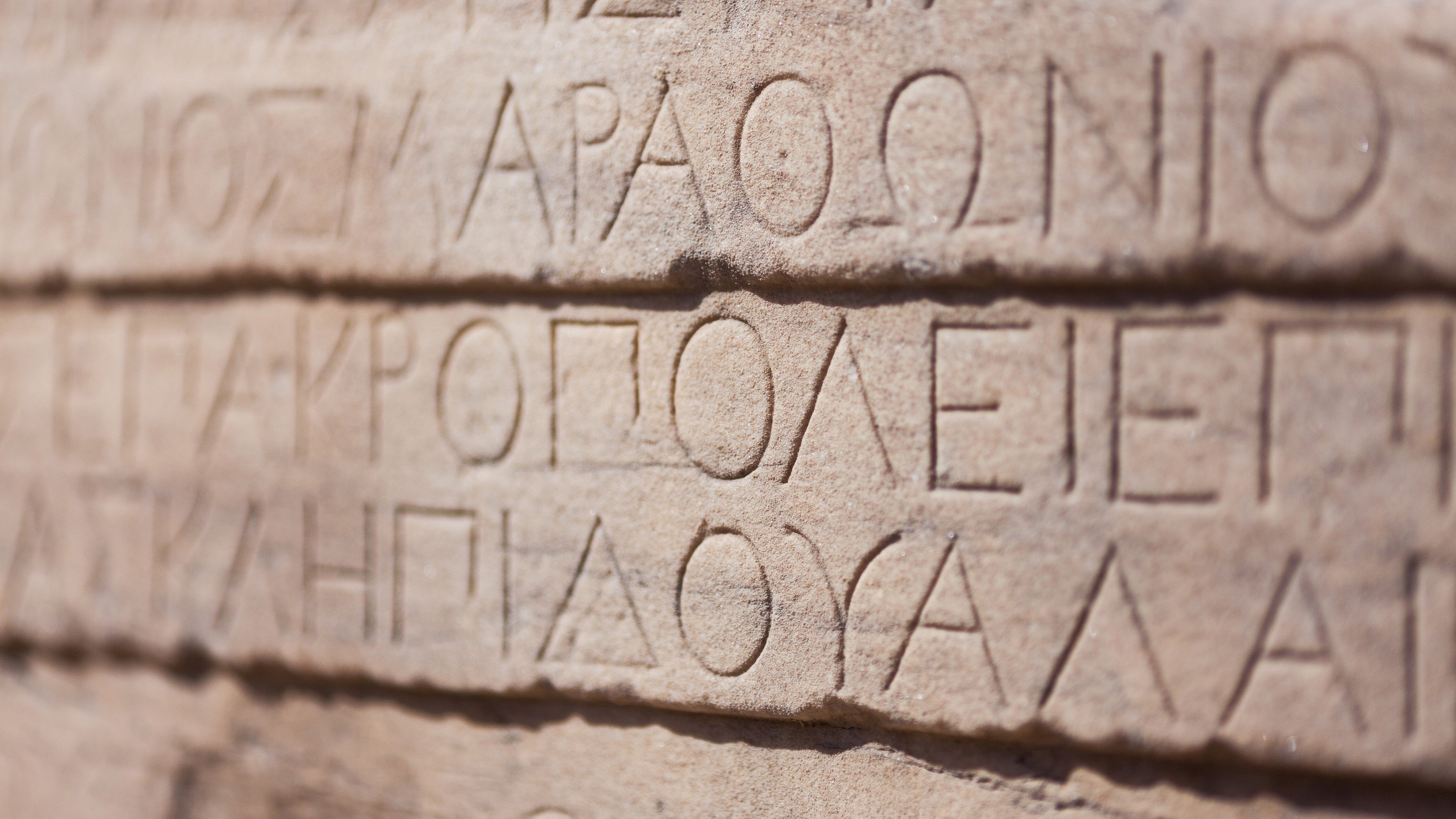 Greek letters alphabet ancient ruins