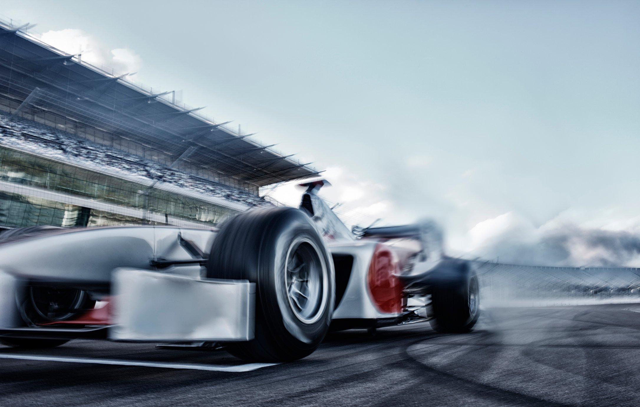 Racecar speeding down a track