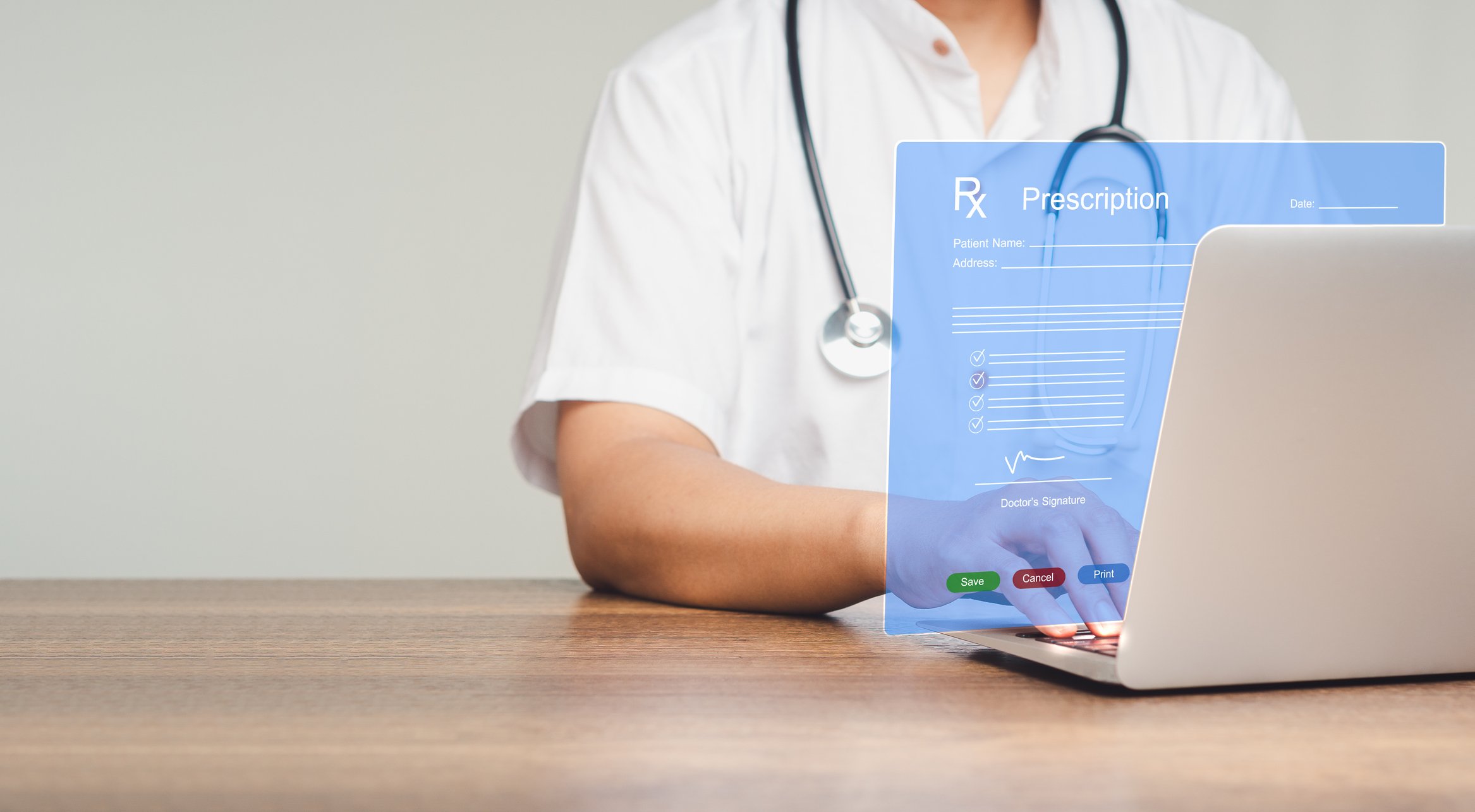 doctor using laptop with graphic of electronic prescription