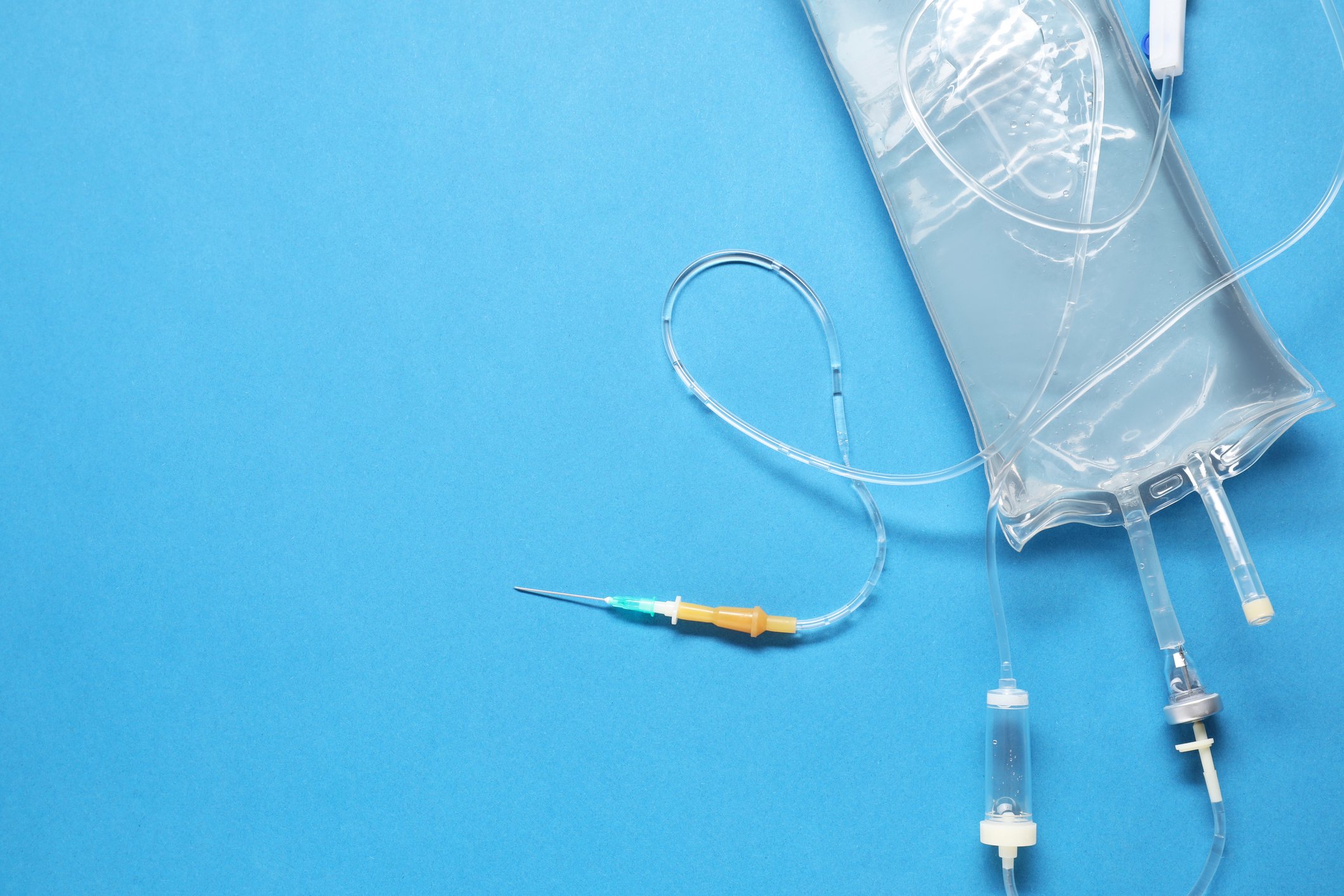 IV bag against a blue background
