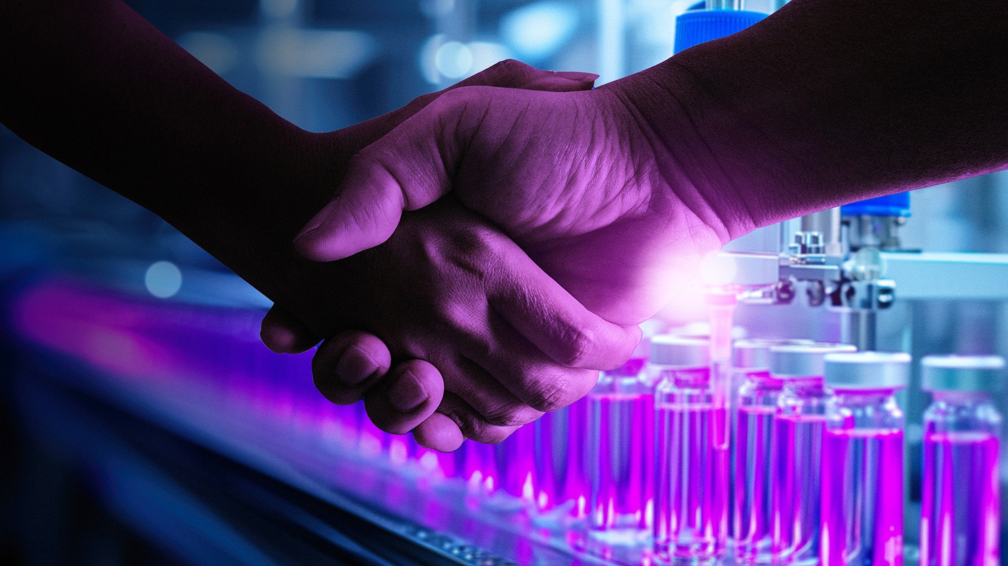 research deal two people shaking hands in lab