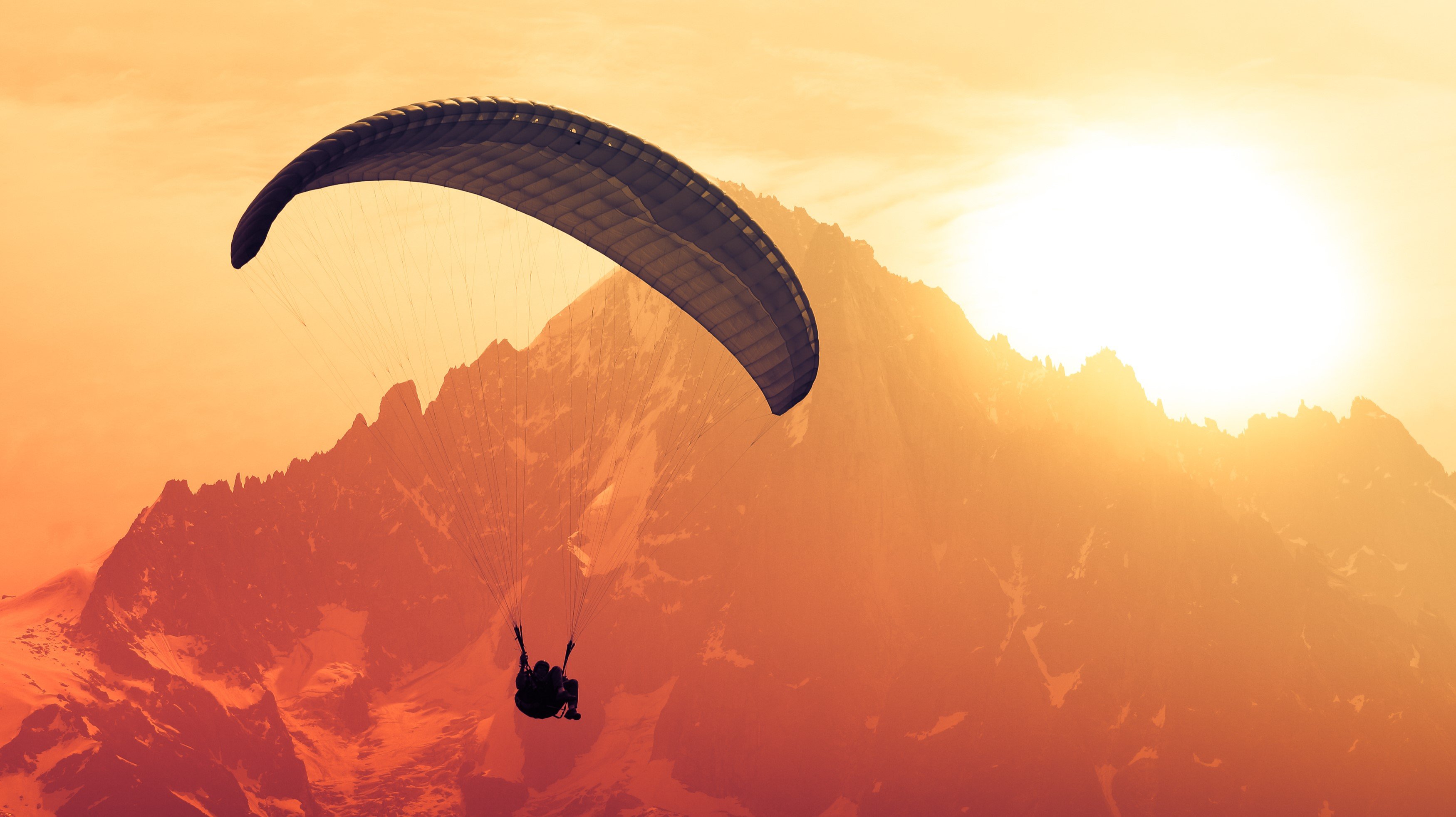 parachute sun mountain sunrise