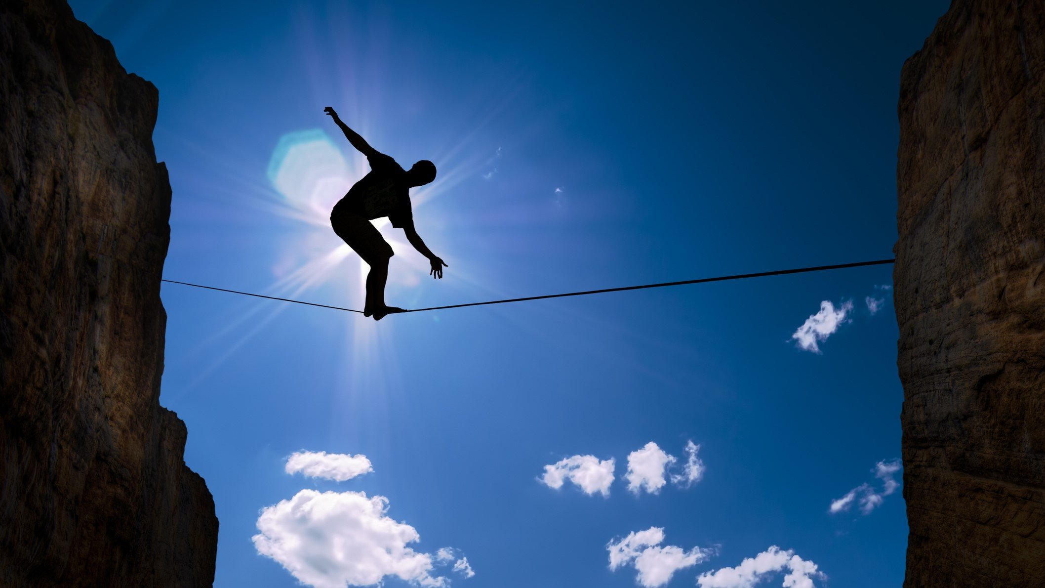 balance tightrope risk