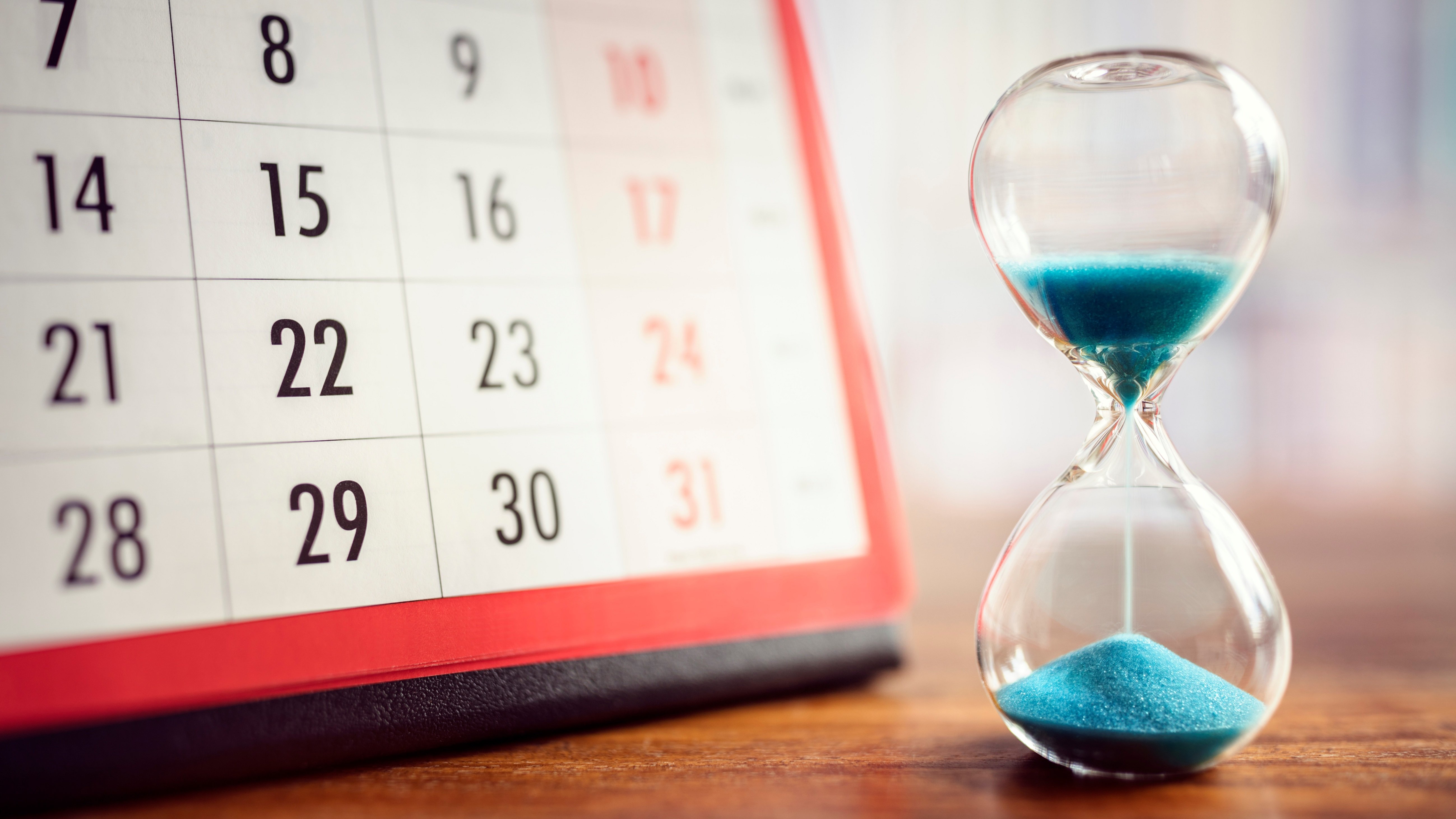 calendar hour glass wait delay months