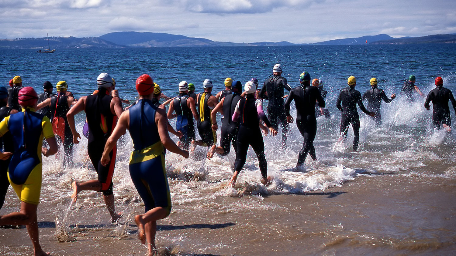 triathlon challenge crowded busy swim water competition race
