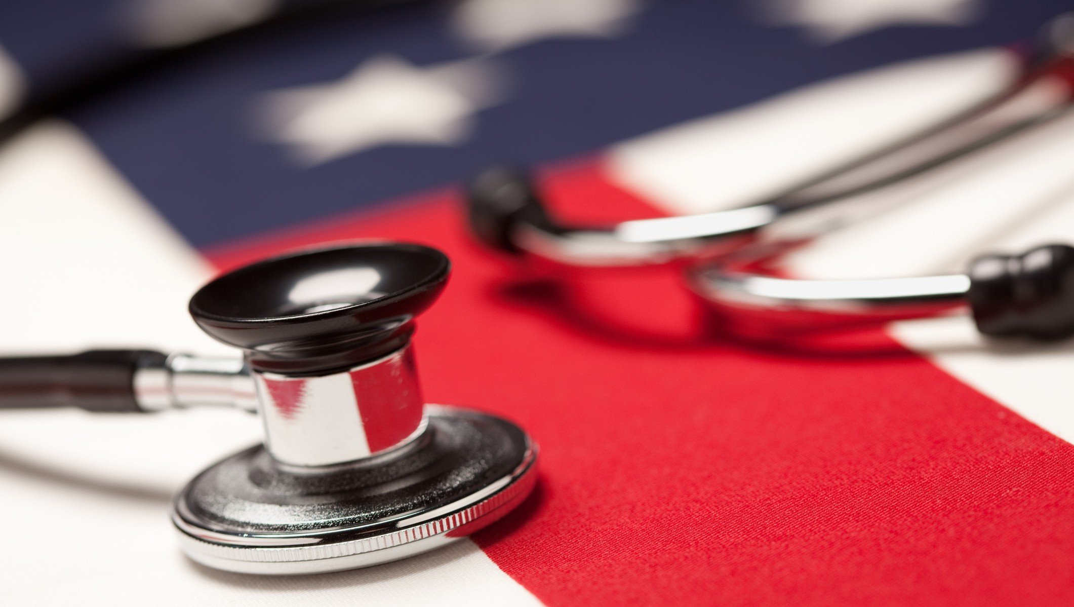A stethoscope resting on flag of USA