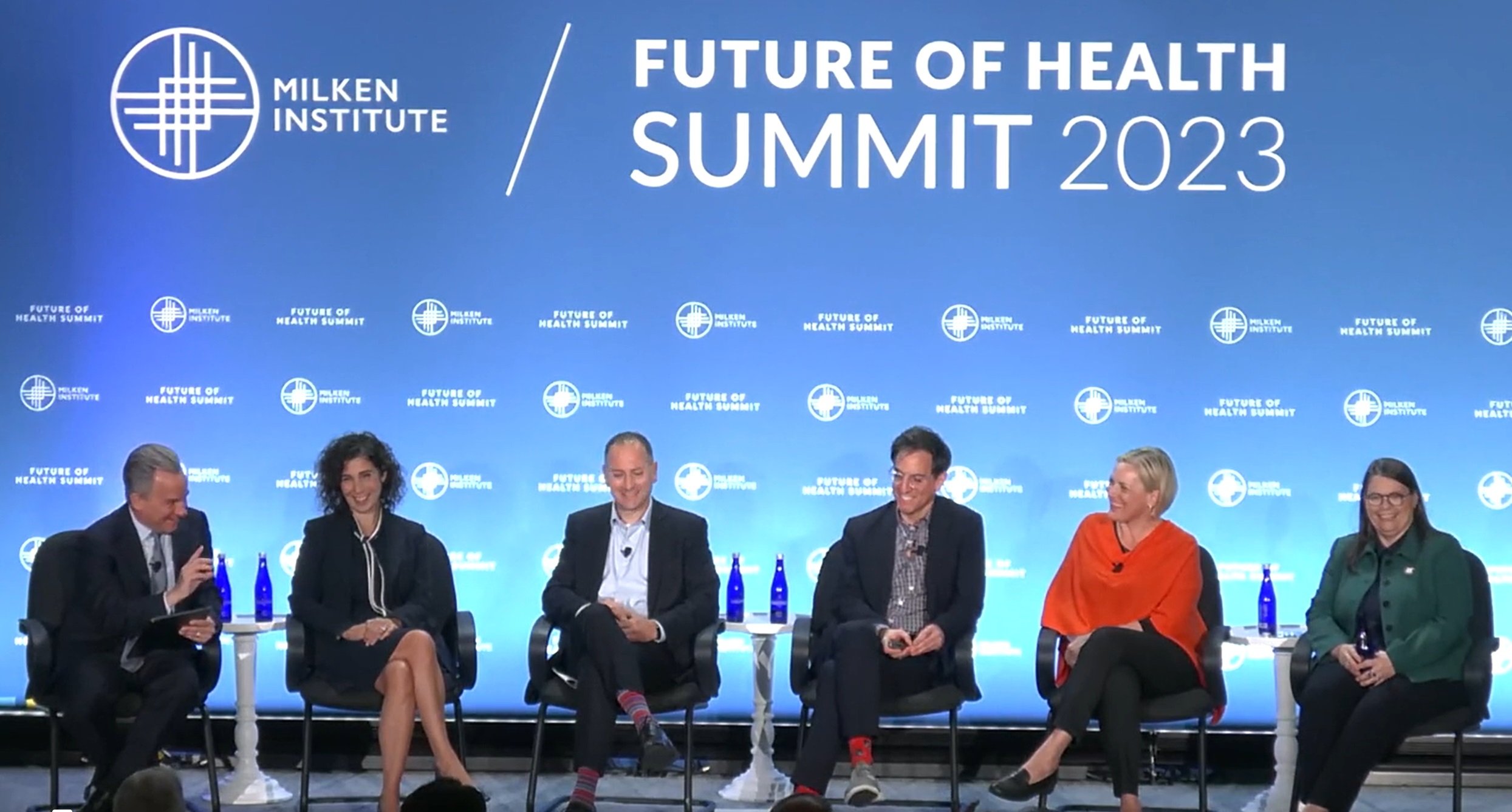 Panelists speak on stage at the Milken Institutes Future of Health Summit event in Washington DC  