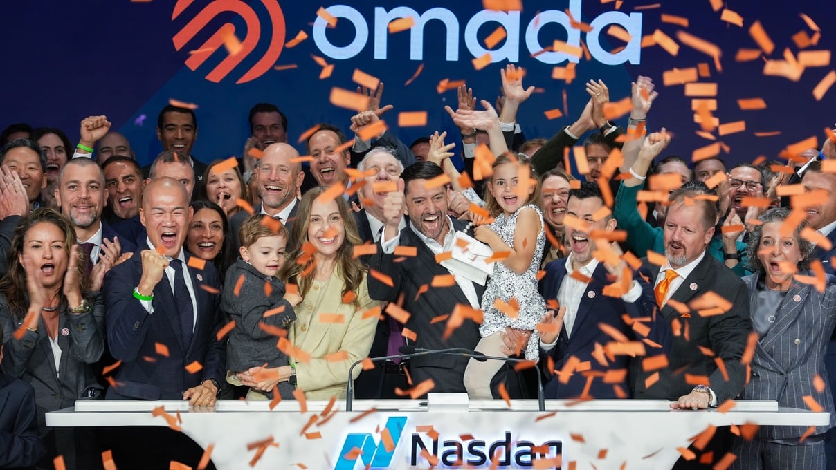 Omada Health executive ring the opening bell at Nasdaq