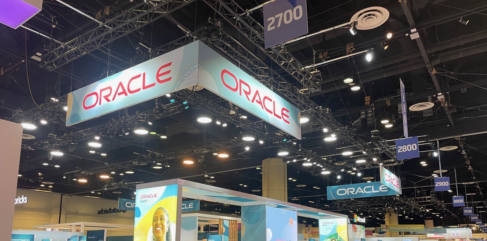 Oracle booth sign at HIMSS24 conference